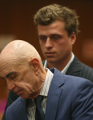 LOS ANGELES, CA - JUNE 29:  Attorney Robert Shapiro (L) and Conrad Hilton speak at Hilton's arraignment at Clara Shortridge Foltz Criminal Justice Center on June 29, 2017 in Los Angeles, California.  Hilton is being arraigned on charges of grand theft auto and violating a restraining order stemming from an incident earlier this year.  (Photo by Frederick M. Brown/Getty Images)